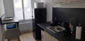 Fotografia z galérie ubytovania l'Aurore Dorée, duplex rénové - parking privé - wifi gratuit v destinácii Saint-Quentin