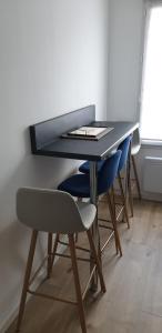 Fotografia z galérie ubytovania l'Aurore Dorée, duplex rénové - parking privé - wifi gratuit v destinácii Saint-Quentin