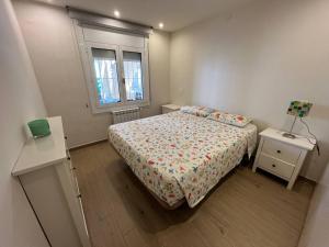 Posteľ alebo postele v izbe v ubytovaní Apartamento en la playa. Free Parking. Free WiFi