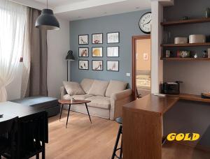 a living room with a couch and a table at Albornoz 35 in Rome