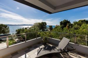 A balcony or terrace at Apartments Bozana Bibinje