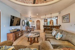 a living room with a couch and a table at Bella Sirena Luxury Condo 205-B in Puerto Peñasco