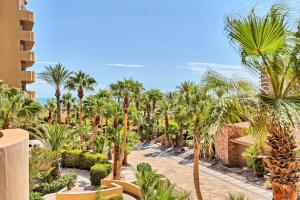 a view of a resort with palm trees at Bella Sirena Luxury Condo 205-B in Puerto Peñasco
