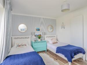 Trem Y Borth Apartment客房内的一张或多张床位