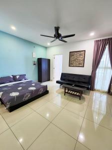 a bedroom with a bed and a piano at Mansion One by Sky Hive in George Town