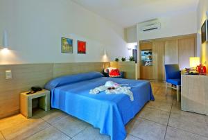 Postel nebo postele na pokoji v ubytování Sitia Beach City Resort & Spa