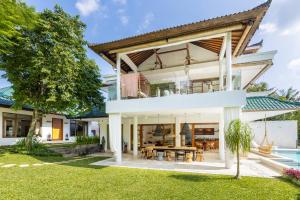 an image of a house with a pool at Luxury Villa in City Center w/ Natural Pool La Bohemia Residence Villas in Ubud