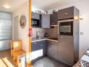 Kuchyň nebo kuchyňský kout v ubytování Val Thorens - Appart pour 6, 3 Flocons Or, 2 bains, proche remontées mécaniques - FR-1-637-48 + 3 fotografie