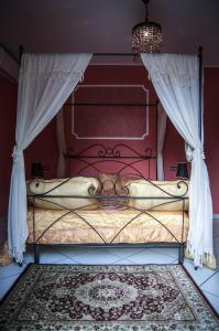 Säng eller sängar i ett rum på Casale delle Rose B&B Fattoria