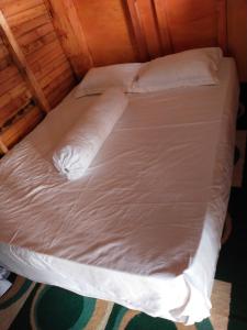 Postel nebo postele na pokoji v ubytování Homestay Pak Ucu