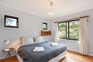 Ένα ή περισσότερα κρεβάτια σε δωμάτιο στο Georgette House in Leura +14 φωτογραφίες