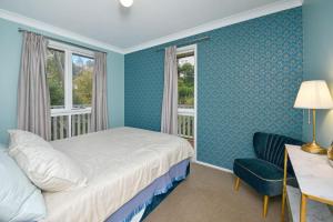 Posteľ alebo postele v izbe v ubytovaní Tree Tops Katoomba