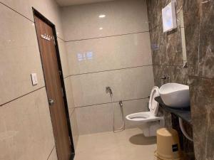 Koupelna v ubytování Hotel Radha krishna