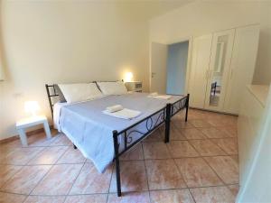 Posteľ alebo postele v izbe v ubytovaní Bologna Apartment