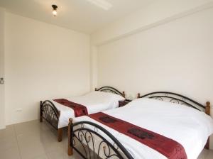 Letto o letti in una camera di 張香民宿1912
