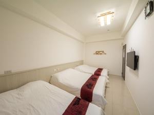 Letto o letti in una camera di 張香民宿1912