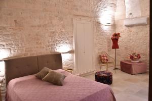 A bed or beds in a room at Antico Corso 74
