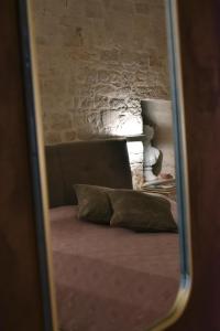 A bed or beds in a room at Antico Corso 74