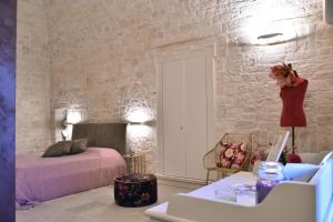 A bed or beds in a room at Antico Corso 74