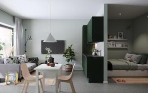 a living room with a couch and a table at Studio Living in Karlskrona