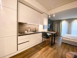 Ένα ή περισσότερα κρεβάτια σε δωμάτιο στο Golden Horn Apartments