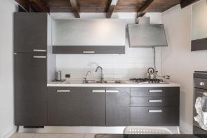 Kuchyň nebo kuchyňský kout v ubytování Casa Artù + 8 fotografií