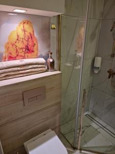 Phòng tắm tại Ambre Mare - Wypoczynek pod Palmami
