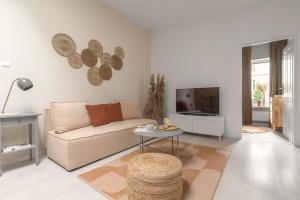 Televízia a/alebo spoločenská miestnosť v ubytovaní HARBOR APARTMENTS - Damrota