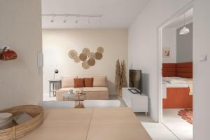 Televízia a/alebo spoločenská miestnosť v ubytovaní HARBOR APARTMENTS - Damrota