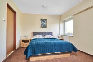 Posteľ alebo postele v izbe v ubytovaní Hostel Relaks