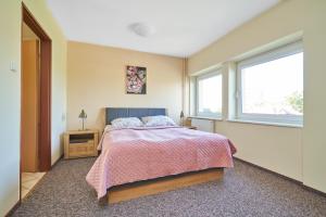 Posteľ alebo postele v izbe v ubytovaní Hostel Relaks