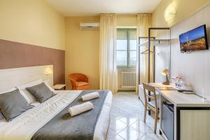 TV a/nebo společenská místnost v ubytování Hotel Castello