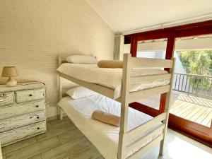 Ένα ή περισσότερα κρεβάτια σε δωμάτιο στο Ohana Beach Cabana - UNBEATABLE LOCACTION - Sea & Dune Views