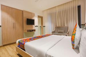 Postel nebo postele na pokoji v ubytování FabHotel Heaven In