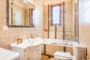 Koupelna v ubytování Olive Villas + 37 fotografií