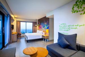 Voodi või voodid majutusasutuse Ibis Styles Bogor Raya toas