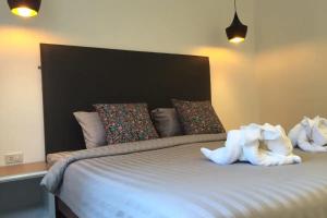 Postel nebo postele na pokoji v ubytování Non Du Lay Guesthouse