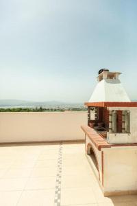 A balcony or terrace at Alcedo Villa
