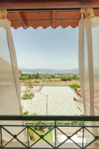A balcony or terrace at Alcedo Villa