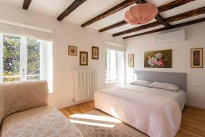 A bed or beds in a room at Ora et Labora