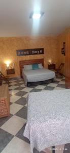 A bed or beds in a room at Casa Monte Los Peñasquitos