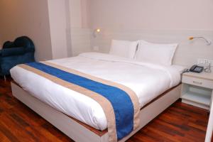 Letto o letti in una camera di Hotel Mega & Apartment