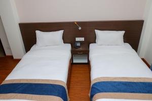 Letto o letti in una camera di Hotel Mega & Apartment