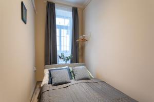 Posteľ alebo postele v izbe v ubytovaní Bokay Apartman next to Corvin Promenade