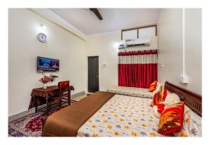Rúm í herbergi á Jaiswal Homestay