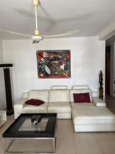 Coin salon dans l'établissement Appartement "AMINA" mit Pool