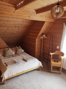 Posteľ alebo postele v izbe v ubytovaní Apartament NA PIĘTERKU