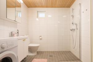 Koupelna v ubytování Tuomenkartano Apartments by Hiekka Booking