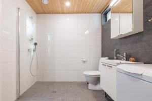 Koupelna v ubytování Tuomenkartano Apartments by Hiekka Booking