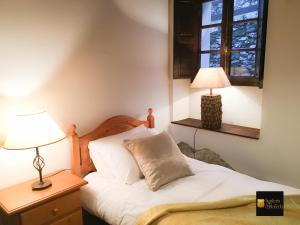 Posteľ alebo postele v izbe v ubytovaní HdeC Hosteria de Castañeda Alojamiento Turistico